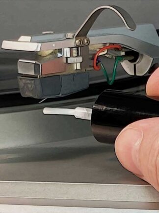 Clean the stylus from dust and debris snagged from the record groove
