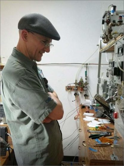 Jeff Kaskey working on machinery